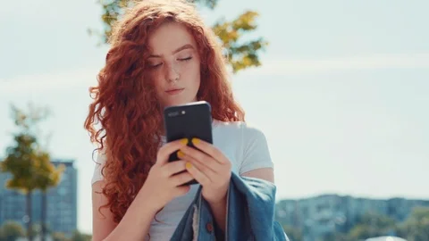 Rotation close up view of extremely beautiful ginger curly girl in white shirt Stock Footage 114247705