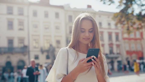 Rotation close up view of smiling blonde Caucasian woman in stylish outfit Stock Footage 112673081
