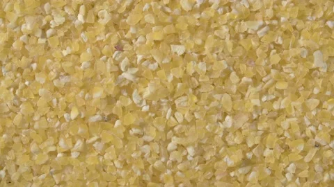 Rotation of corn grits close up. Macro. 4K video. Healthy eating. Stock Footage 143785550