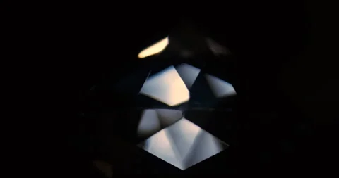 Rotation of the diamond. Reflection of light from the facets of the rhinestone Stock Footage 164191356