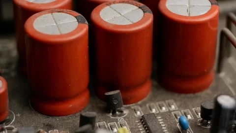 Rotation of the dirty electrical circuit of the amplifier. Large capacitors. Stock Footage 170803787