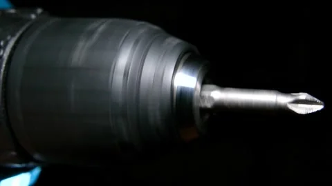 Rotation of an electric drill with screwdriver in slow motion. Stock Footage 240579510