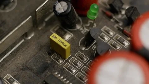 Rotation the electrical circuit of the audio amplifier. Small items and LED. Stock Footage 171195687