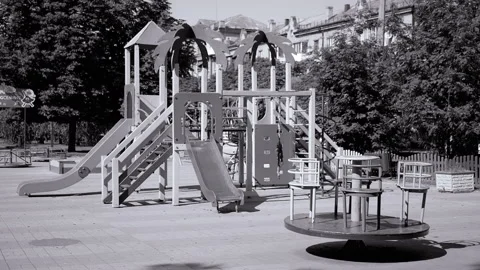 Rotation of an Empty Multicolored Carousel on a Playground in a City Park 動画素材 158946032