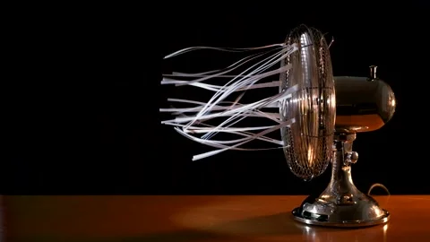 The rotation of the fan blades develops sheets of paper. Stock Footage 170102402