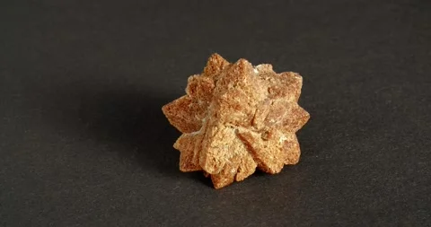 Rotation of glendonite on a black background. Stockbeeldmateriaal 167583944