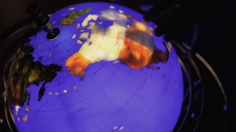 Rotation of a glowing globe Stock Footage 76875211