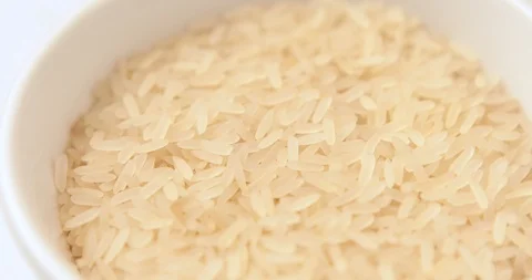 Rotation of the grain of rice in a pot. Stock Footage 95503024