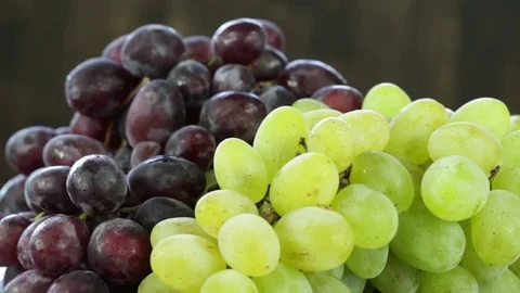 Rotation green grapes and red grapes Stock Footage