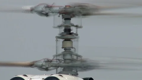 Rotation of helicopter rotor column Ka-32 helicopter. Close-up. Video stock 106607375
