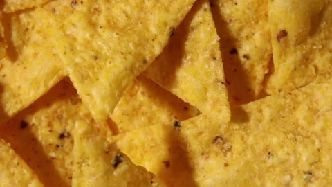 Rotation macro nacho chips, Background of Corn Tortilla Chips or Nachos Stock Footage 170688666