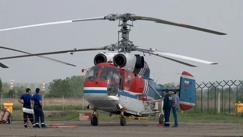 Rotation of main rotor blades after launch of main engines Ka-32 helicopter. Stock Footage 106607367