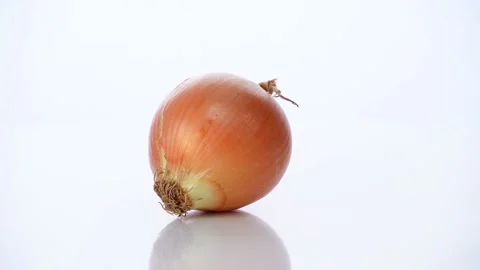 Rotation Of Onion with white background Stock Footage 237014138
