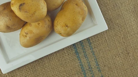 Rotation of Potato Macro Close Up Stock Footage 107406925