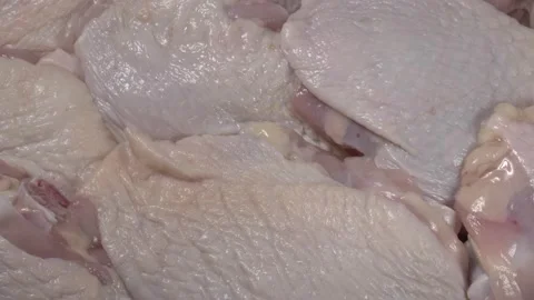 Rotation of raw chicken meat close up. Chicken thighs. Stockbeeldmateriaal 143782047