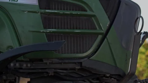 Rotation of a red wheel while a large heavy industrial piece of equipment Stock-Footage 270061785