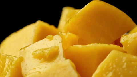 Rotation of rip mango slice cubes cut, Mango half cut in cubes, Fresh juicy m Stock Footage 172053910