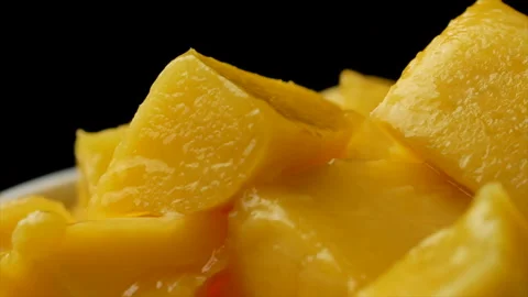 Rotation of rip mango slice cubes cut Stock Footage 263467627