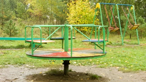 Rotation of a roundabout and shakes swing on background Video stock 45178573