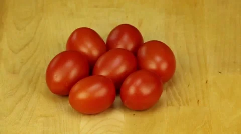 Rotation of six plum  tomatoes Stock Footage 45740276
