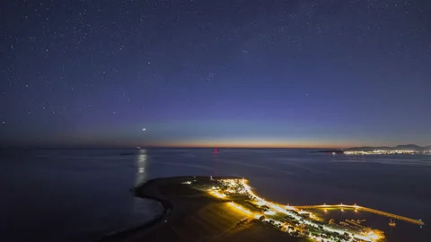 Rotation of the starry sky over Alnes Stock Footage 147432901