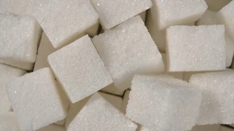 Rotation of sugar lumpy close-up. White sugar. Sugar cubes. Stock Footage 143785388