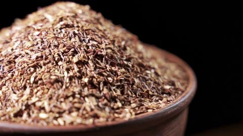 Rotation of tea close-up. Dry tea tree leaves. Tea brewing Stock Footage 150294773