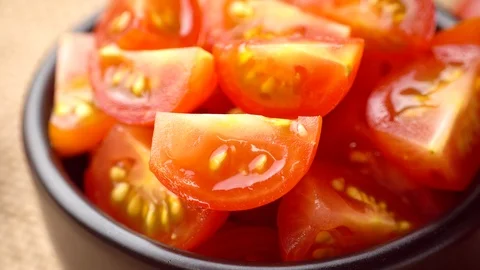 Rotation of Tomatoes (sliced), close-up, 4K Stock Footage 99526862