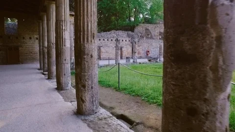 Rotation view of ancient gothic stone wall with arches and columns, ruins of Video stock 108729834