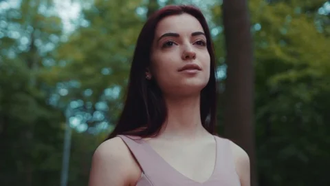 Rotation view of an extremely beautiful long-haired woman with light makeup Stock Footage 91497422