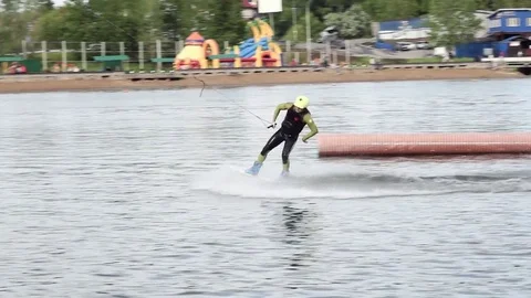 Rotation on the wakeboard. Water training Stock Footage 76829007