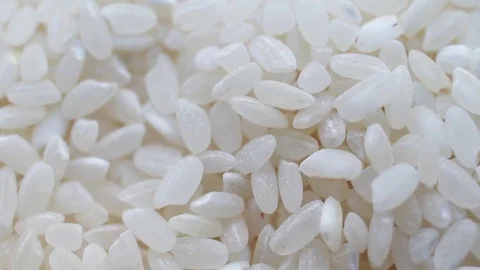 Rotation of a white rice Stock Footage 83388917