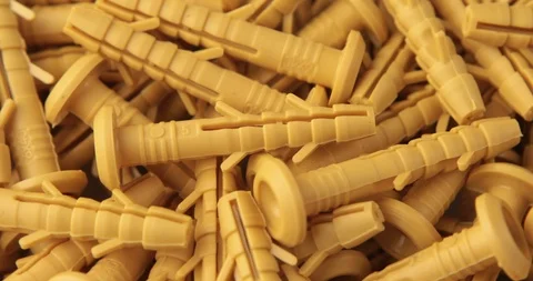 The rotation of the yellow dowels Stock Footage 105577383