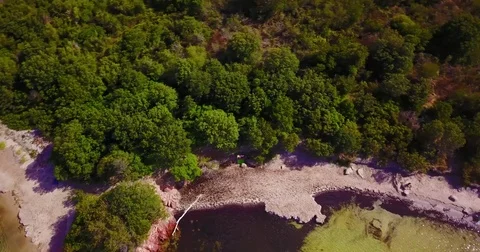 Rotational view over an island from top Stock Footage 78546955