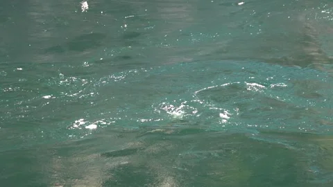 Rotational vortex whirlpool disturbs water surface - Motion and Water Movement Stock Footage 339590149