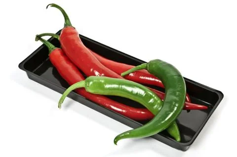 Rote und grüne Pepperoni Stock Photos