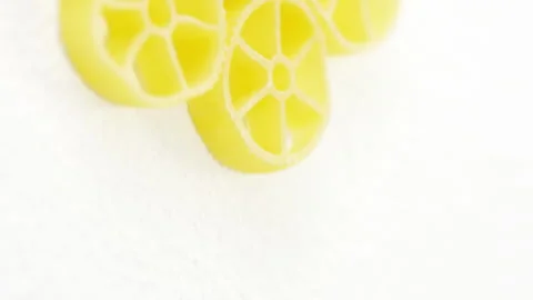 Rotelle pasta on white background Stock Footage 300931771