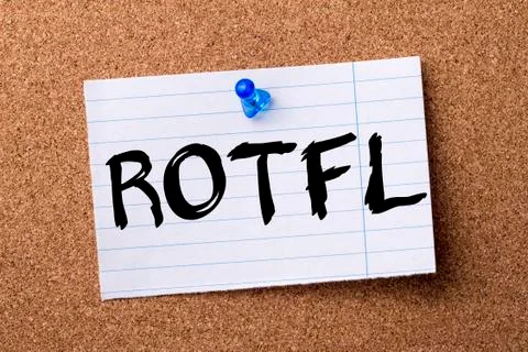 ROTFL - teared note paper pinned on bulletin board Foto stock