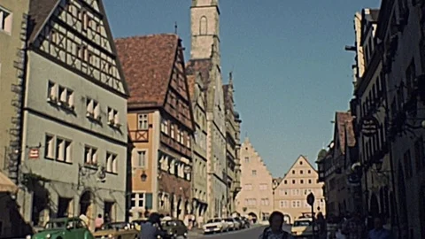 Rothenburg ob der Tauber 1976: people walk in the main street Stock Footage