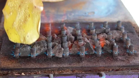 Roti Cooking on Open Flame Stove Close-Up Stock Footage 333070013