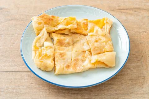 Roti with egg and sweetened condensed milk Stock-Fotos