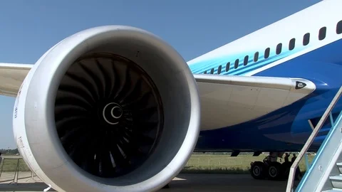 Rotor of rotating engine under wing of Boeing 787 Dreamliner. Close-up. Video stock 107132626