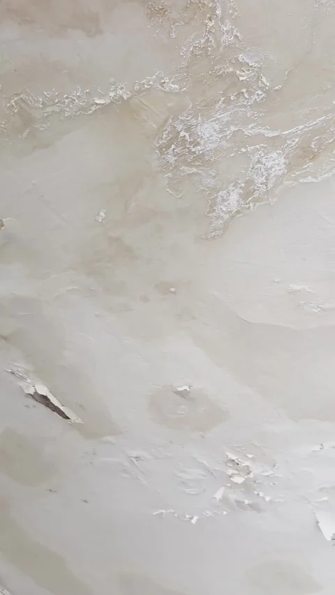 Rotten cracked damp wall or ceiling in old broken-down building vertical pov Stock Footage 339154504