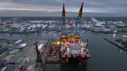 Rotterdam, Netherlands. Drone flight over industrial area with cargo ports Stock Footage 332504550