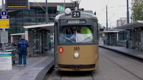 ROTTERDAM, NETHERLANDS - SEPTEMBER 13, 2025 - Historic tram number 21 to Stock Footage 327659270