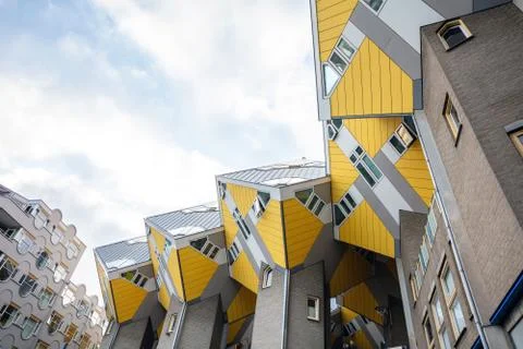 Rotterdam, Netherlands. Yellow cube compact houses against blue sky. Stock Photos