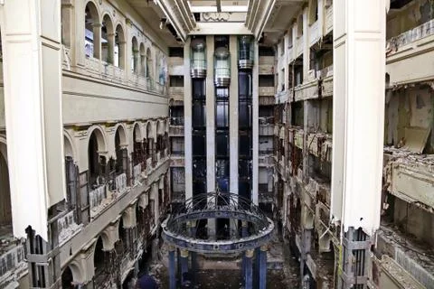 Rotunda in the main hall with elevators of a dilapidated abandoned hotel Stock Photos