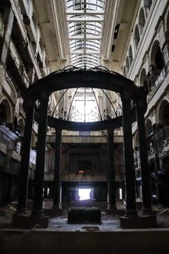 Rotunda in the main hall with elevators of a dilapidated abandoned hotel Stock Photos