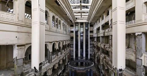 Rotunda in the main hall with elevators of a dilapidated abandoned hotel Stock Photos