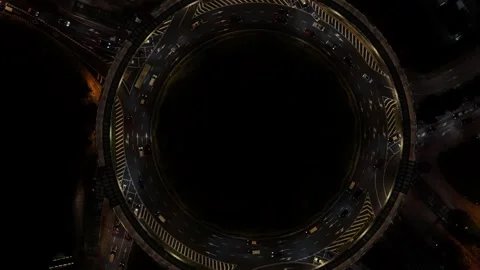 Rotunda Park roundabout in Macau at night, flying upwards Stock Footage 336389746